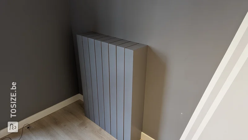 Homemade radiator conversion from custom-sawn MDF, primed, by Job