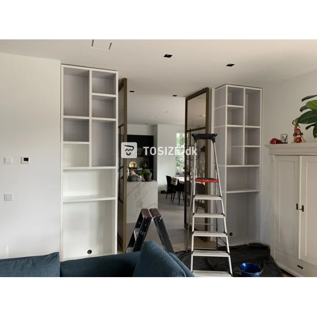 White bookcase with doors and open compartments