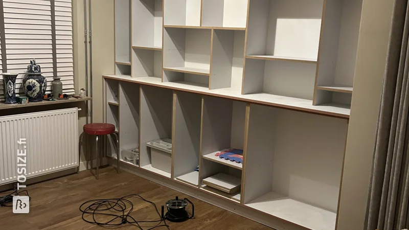 Create a shelving unit in the alcove of your living room, by Ricky