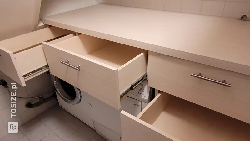 A self-made laundry room with lots of storage space, by Paul