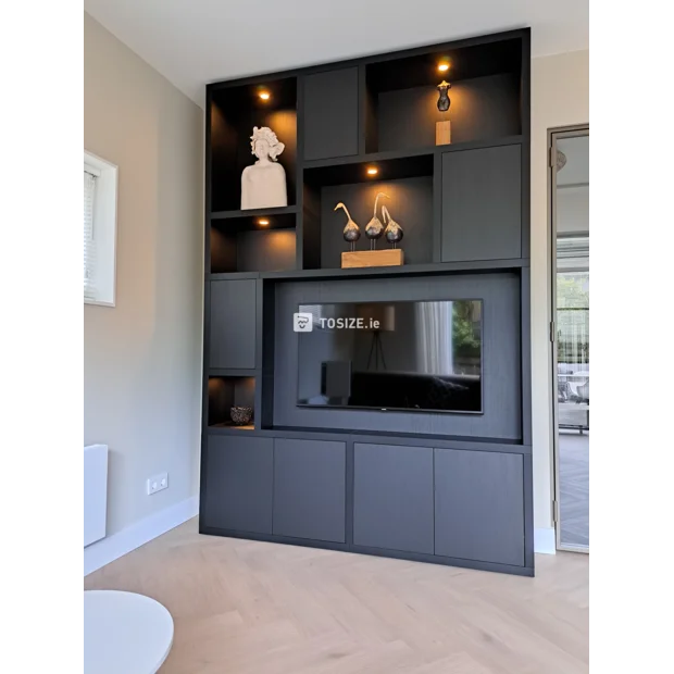 Black cupboard wall with open compartments and doors