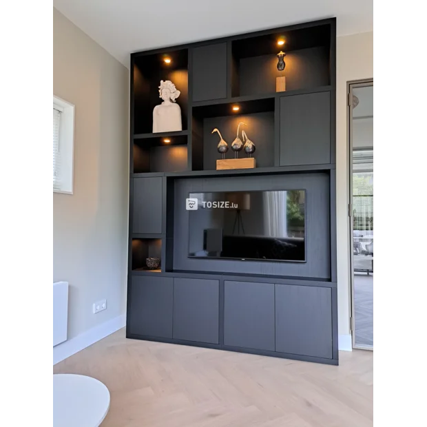 Black cupboard wall with open compartments and doors