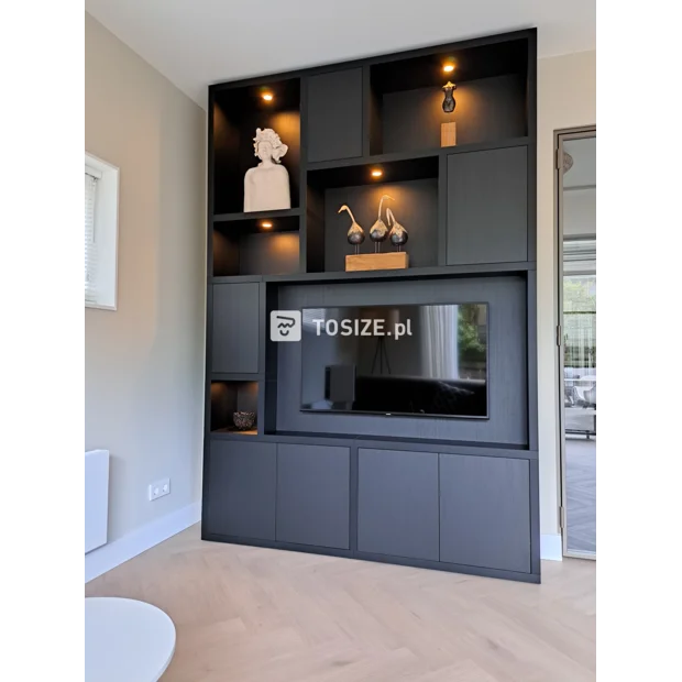 Black cupboard wall with open compartments and doors