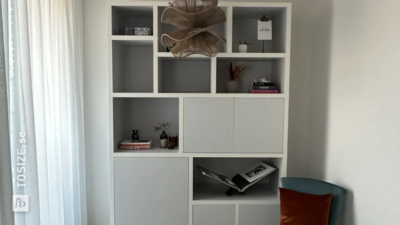 Compartment cabinet with storage space for turntables, by Carolien