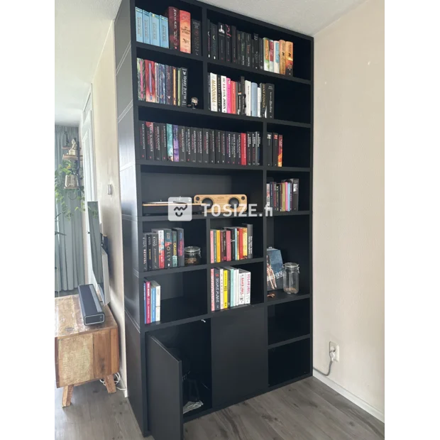 Black bookcase with open shelves and doors