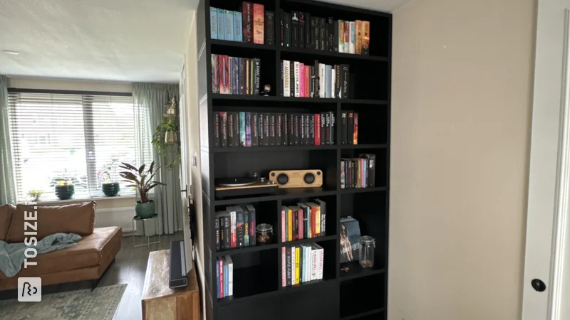 Ceiling-length bookcase with TOSIZE Furniture, by Arnold