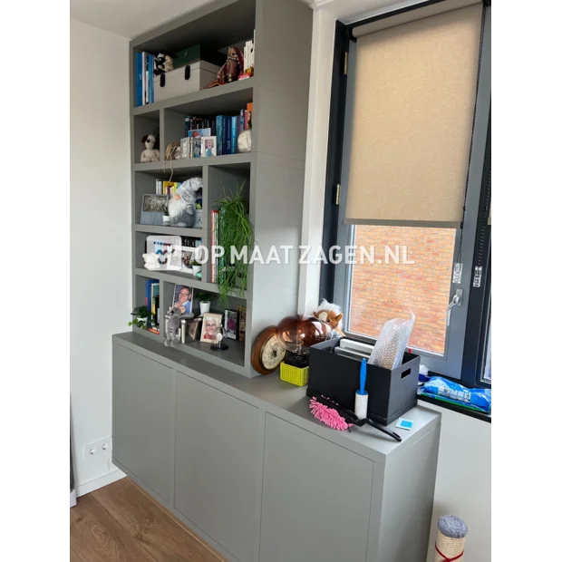 Gray cupboard wall with open compartments and doors