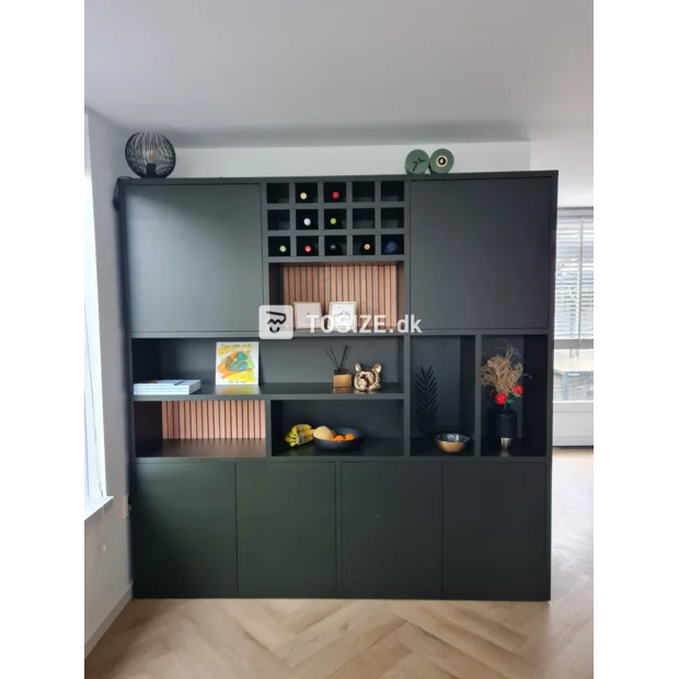 Dark green cabinet with doors and open compartments