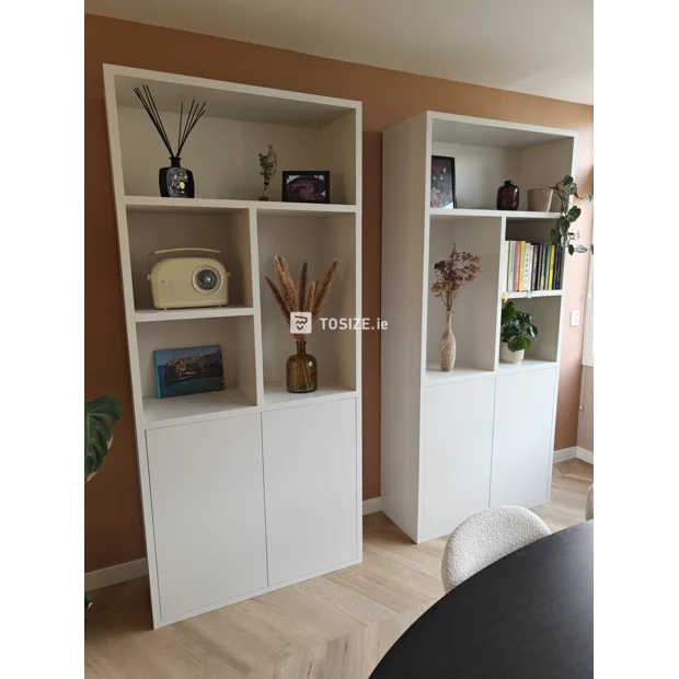 White bookcase with open shelves and doors