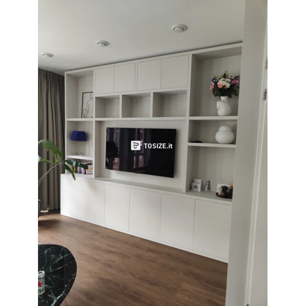 White cupboard wall with doors and open compartments