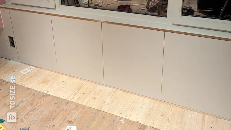 Practical knee bulkhead cupboard and windowsill in dormer window, by Tony