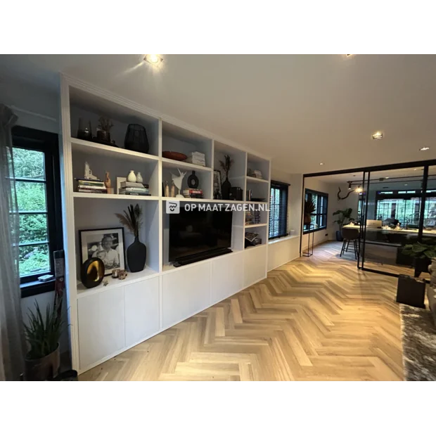 White cupboard wall with open compartments and doors