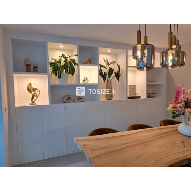 White cupboard wall with doors and open compartments