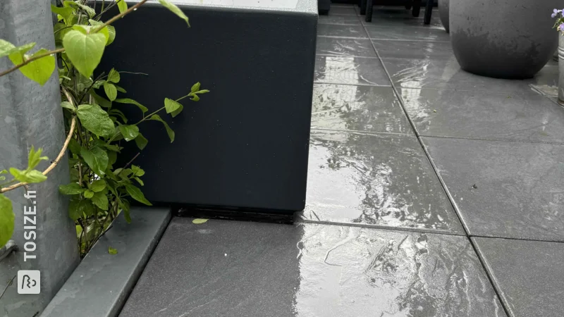 Create sustainable elegance with concrete plywood flower boxes on an even concrete slab, by Martin