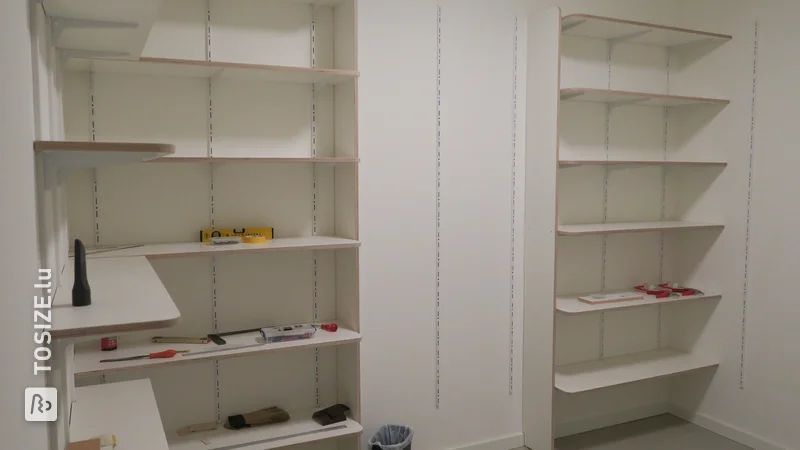 Custom-made storage shelves in new apartment, by Anton