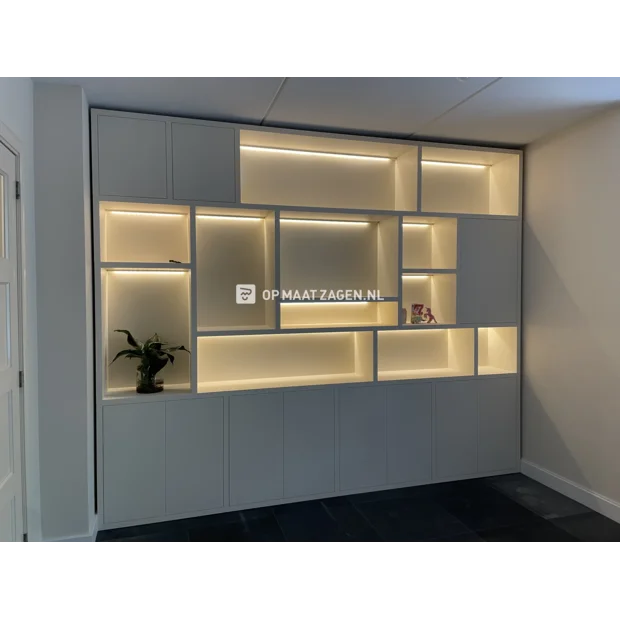 White cupboard wall with open compartments and doors