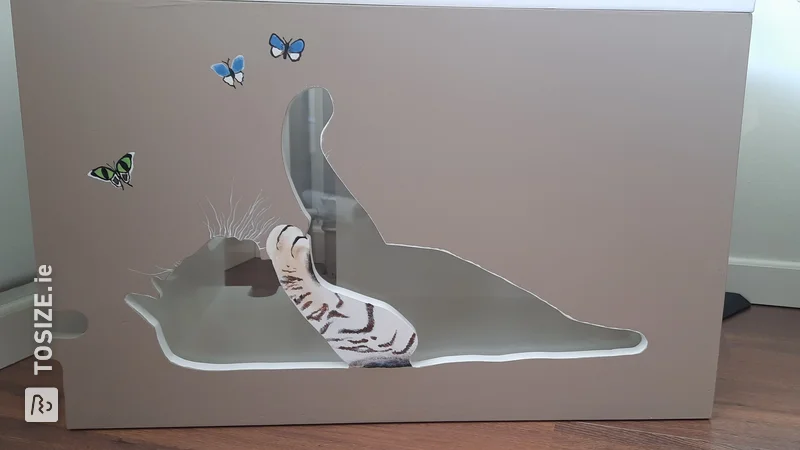 DIY sleeping box for cats with extra seating, by Chantal