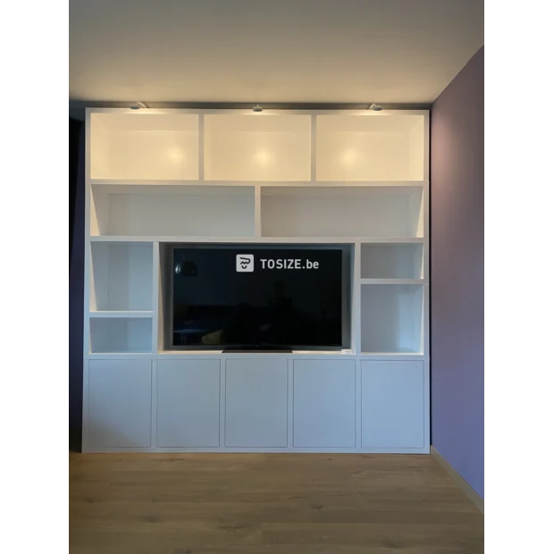 White cupboard wall with open compartments and doors