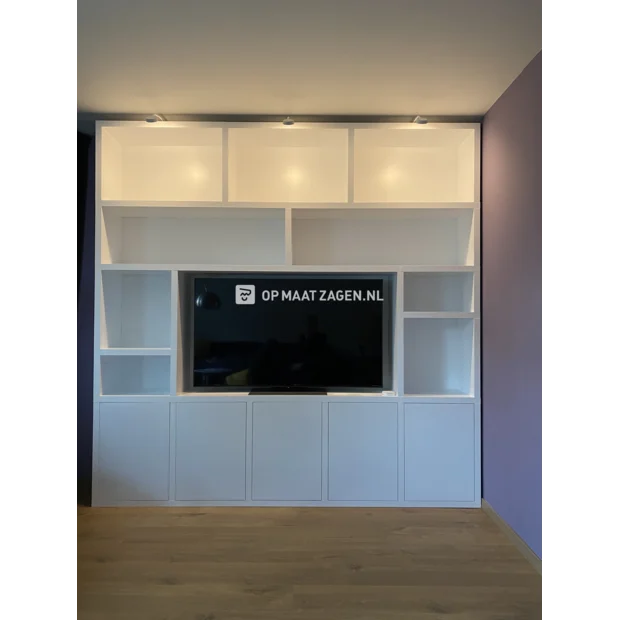 White cupboard wall with open compartments and doors