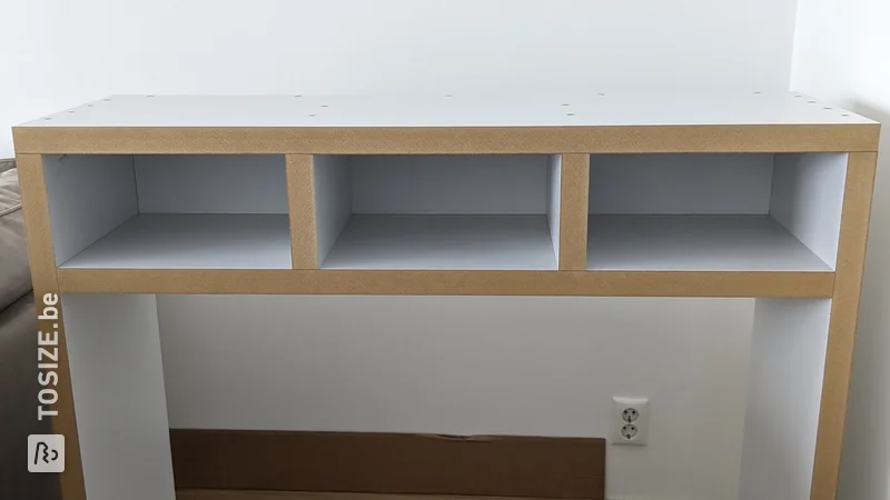 Practical table with custom-made compartments, by Chris