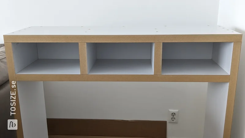 Practical table with custom-made compartments, by Chris