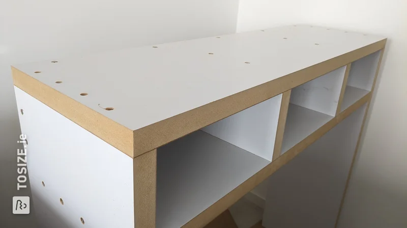 Practical table with custom-made compartments, by Chris