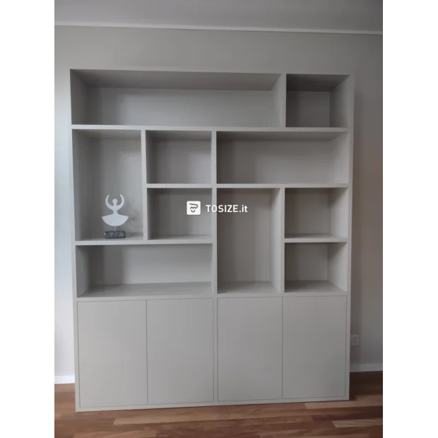 White cabinet with open compartments and doors