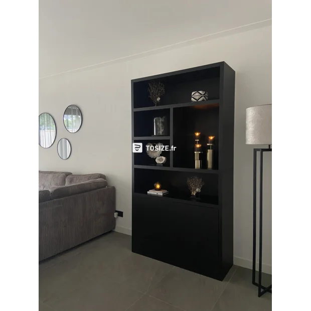 Black cupboard wall with doors and open compartments