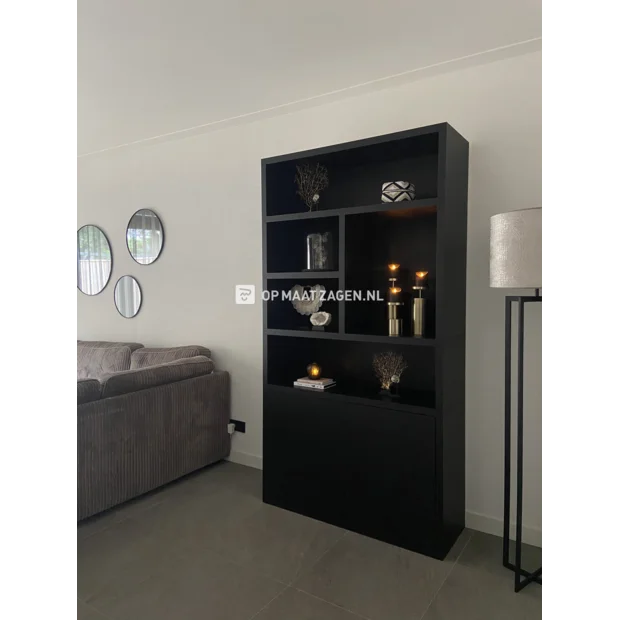 Black cupboard wall with doors and open compartments