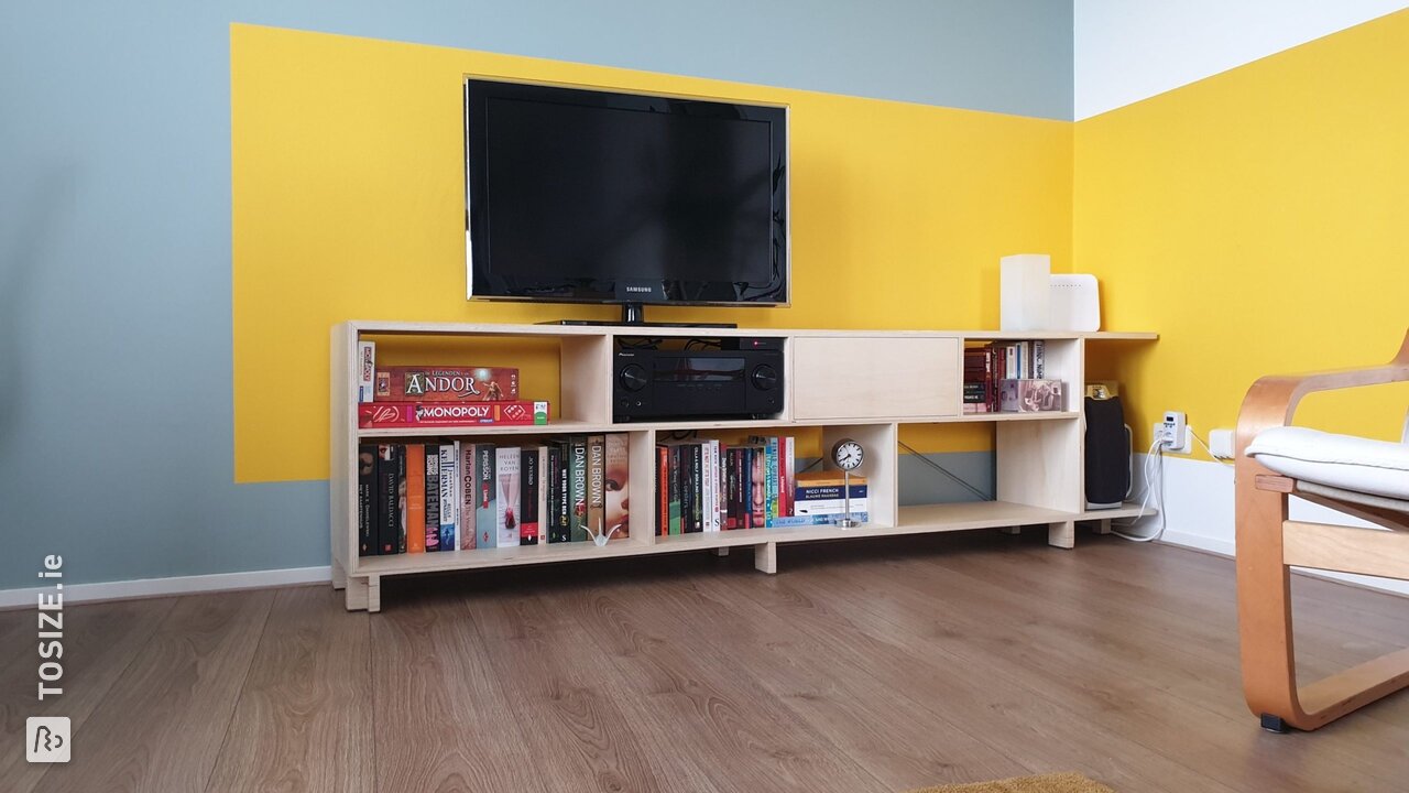 TV unit with storage space made of plywood, by Adrianne