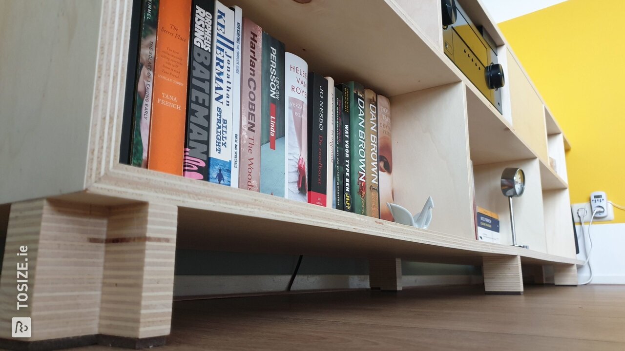 TV unit with storage space made of plywood, by Adrianne