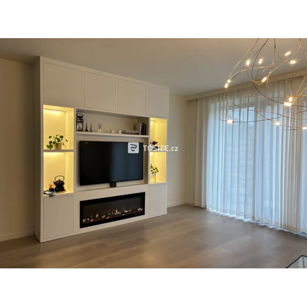 White cupboard wall with doors and open compartments