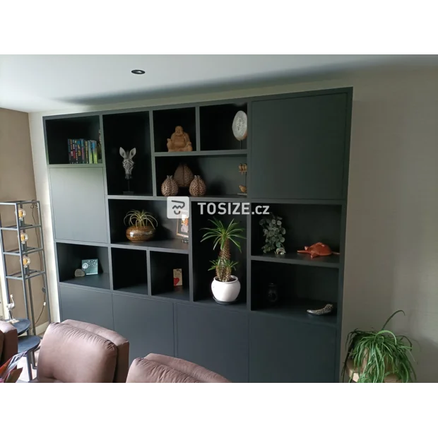 Black cupboard wall with open compartments and doors