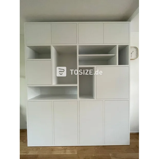 White cabinet with doors and open compartments