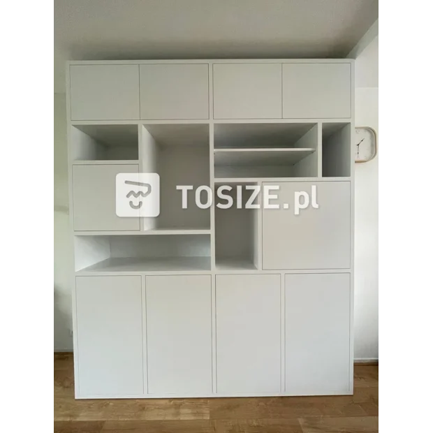 White cabinet with doors and open compartments