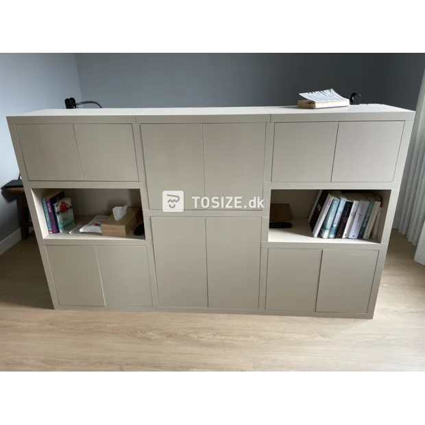 Cream sideboard with open compartments and doors