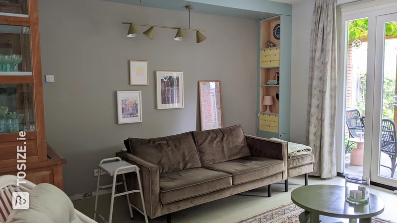 Unique bookcase and cove in living room, by Femke