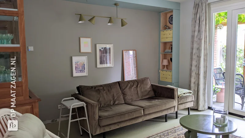 Unique bookcase and cove in living room, by Femke