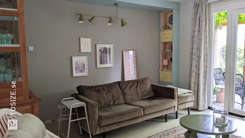 Unique bookcase and cove in living room, by Femke