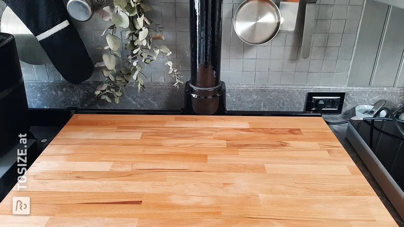 Creative raised shelf for an induction hob, by Cleo