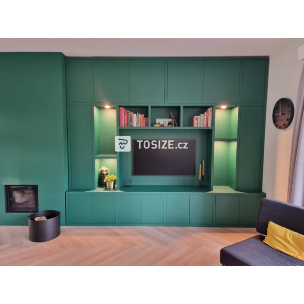 Green cupboard wall with doors and open compartments