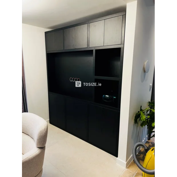 Black cupboard wall with doors and open compartments