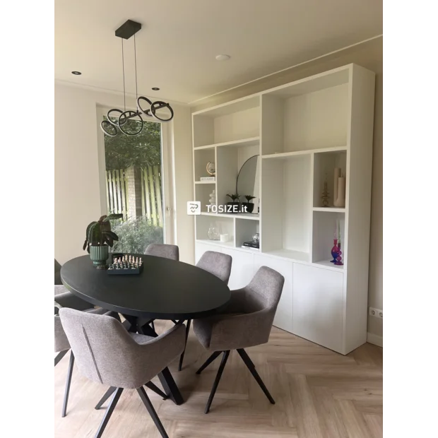 White cupboard wall with doors and open compartments