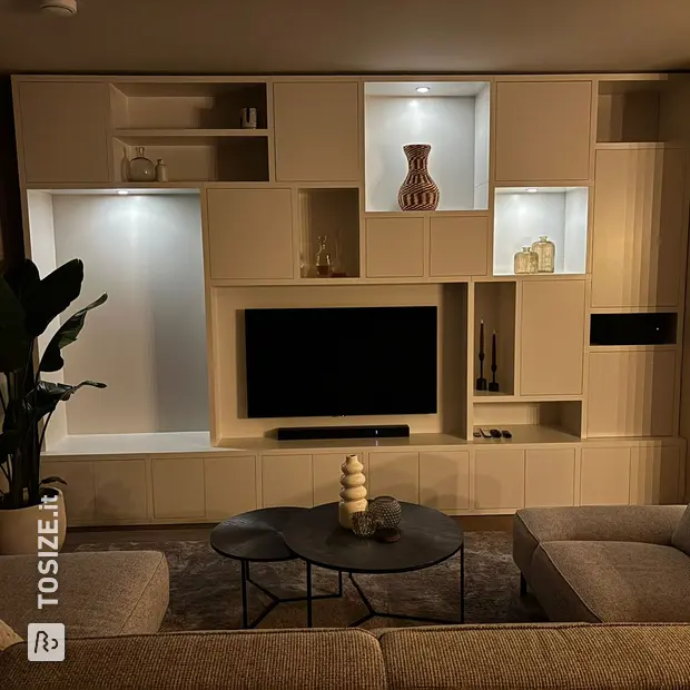 White cupboard wall with open compartments and doors