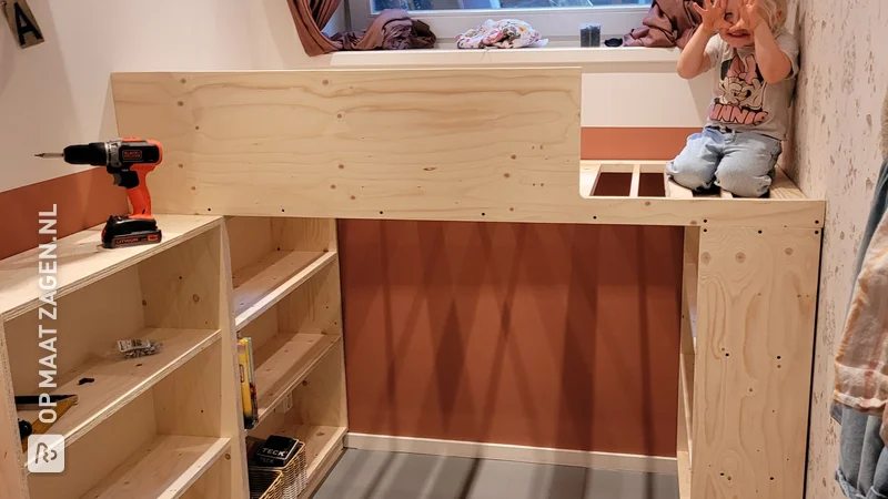 Multifunctional loft bed with desk and storage space, by Liesbeth