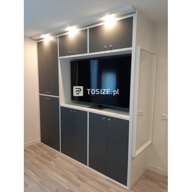 Gray cupboard wall with doors and open compartments