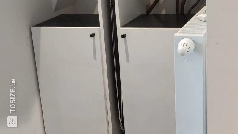 Storage cabinets under the boiler, by Nicky