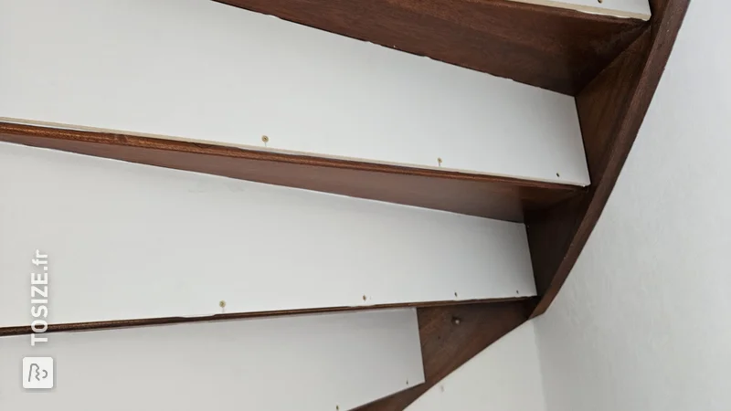 Installing kickboards on stairs, by Linda