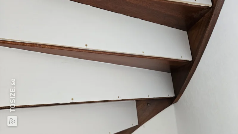 Installing kickboards on stairs, by Linda