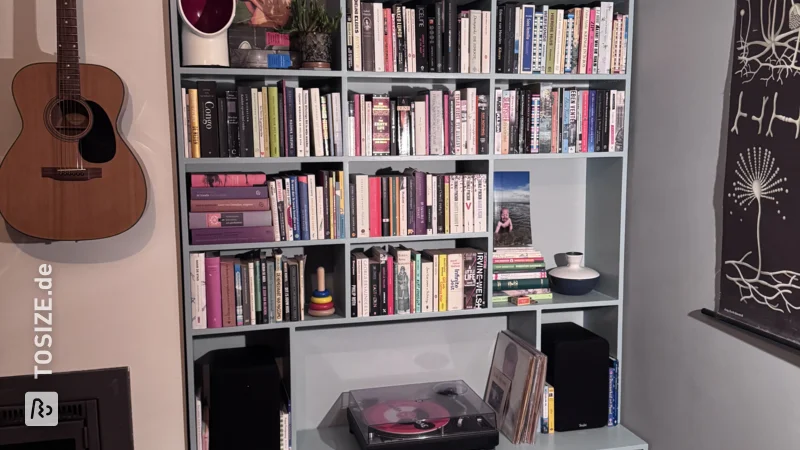 Make your own blue bookcase with base cabinet for the living room, by Jaap